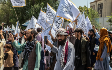 Supporters of the Taliban gather in front of the U.S. Embassy on August 2024